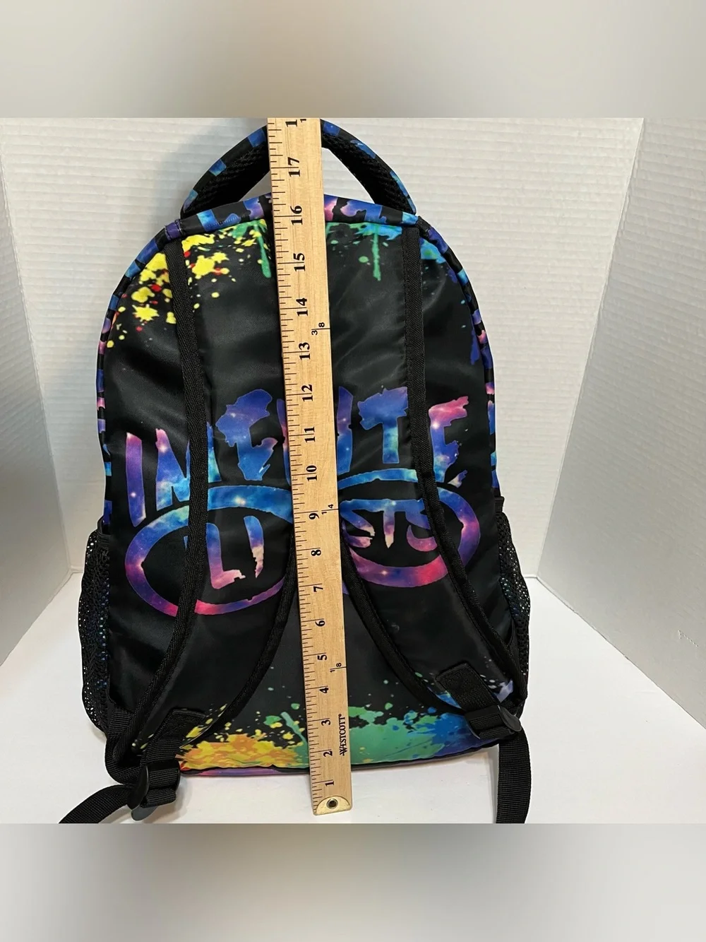 Infinite STS Graphic Black Backpack with Neon Paint-Splash